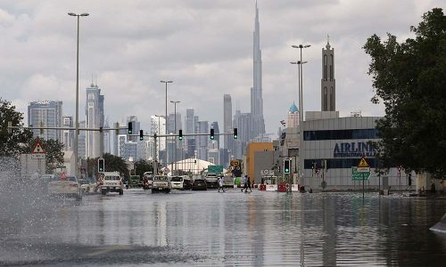 A general view of flood water caused by heavy rains, with the Burj Khalifa tower visible in the background, in Dubai, United Arab Emirates, April 17, 2024. REUTERS/Amr Alfiky